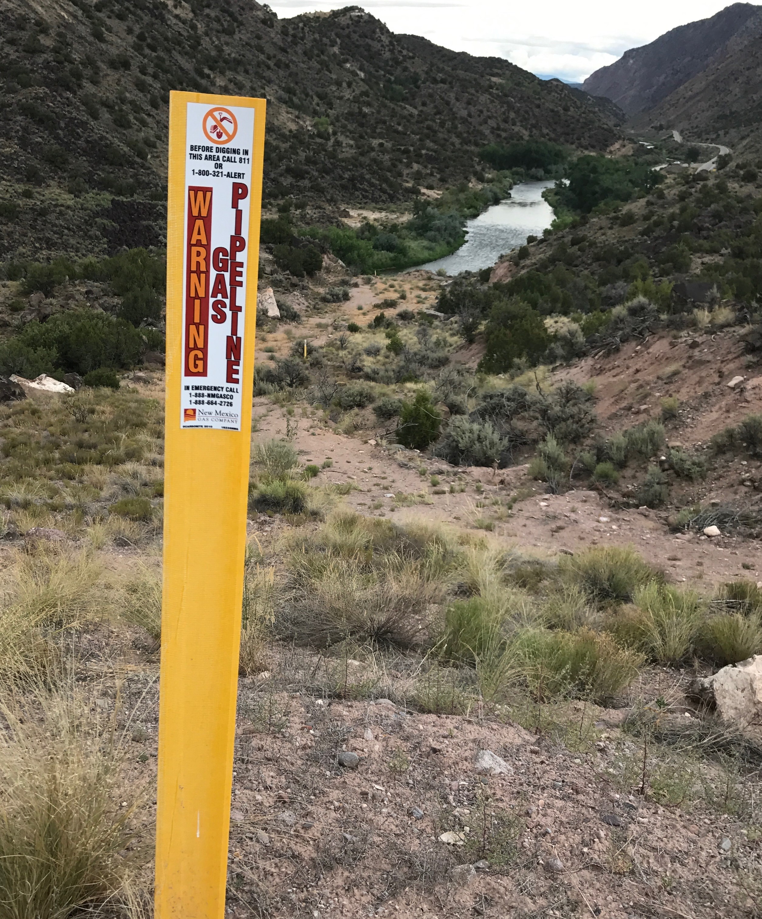 A yellow pipeline marker.